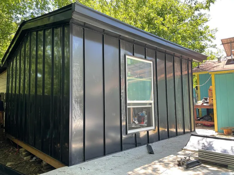 Black standing seam metal wall panels for Metal Roof Installation in June Park
