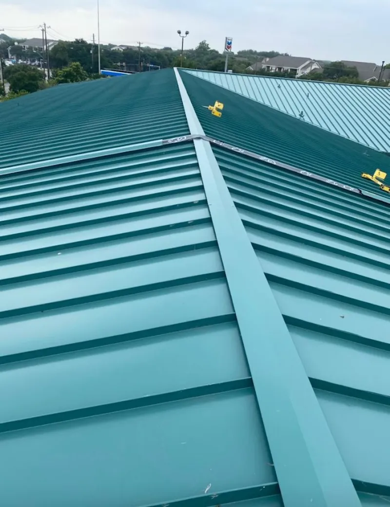 Green commercial metal roof ridge and valley for Metal Roof Repair in June Park